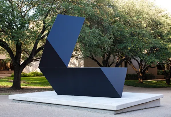 A painted steel outdoor sculpture with geometric shapes in a v-shape; Tony Smith's Amaryllis, 1975